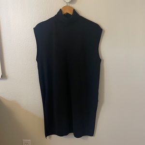 Black turtle neck vest , knee length
